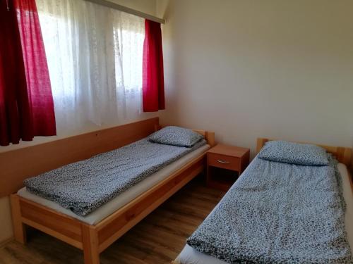 Tempat tidur dalam kamar di Ośrodek wczasowy Raciąż