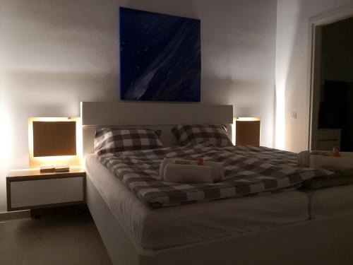 Postel nebo postele na pokoji v ubytování Sunset Sea View Villa 2