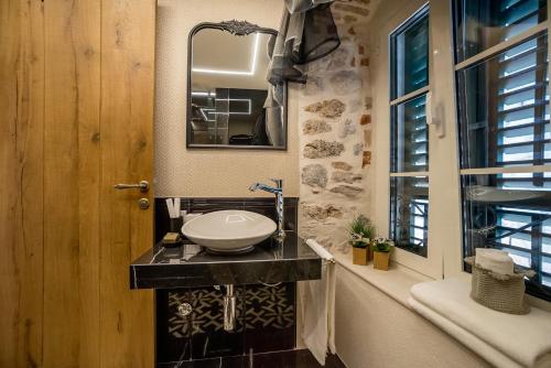 Ένα μπάνιο στο Apartments Hun