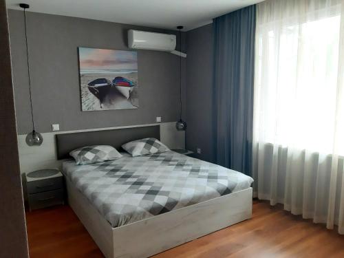 Postel nebo postele na pokoji v ubytování Laguna