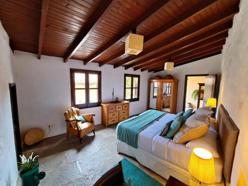 Ένα ή περισσότερα κρεβάτια σε δωμάτιο στο RK Hacienda La ReKompensa