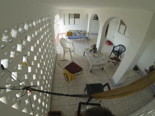 an overhead view of a living room with a couch and chairs at Tina's Guest House in Ocho Rios