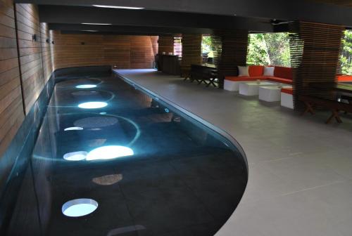 a jacuzzi in a building with lights on it at Rêve de Saint Barth - Vue Mer - Piscine Chauffée & Jacuzzi in Gustavia