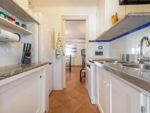 Kuchyň nebo kuchyňský kout v ubytování Relais Baia di Nelson