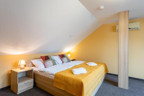 Postel nebo postele na pokoji v ubytování Hotel Libero