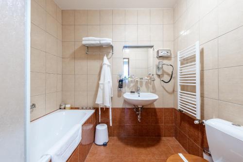 Kylpyhuone majoituspaikassa Hotel Libero