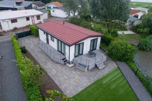 an aerial view of a house with a red roof at chalet Esra 190 in Sint Annaland