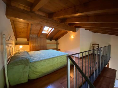 Säng eller sängar i ett rum på Residence la Quiete Apartments