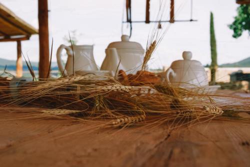 a pile of straw sitting on a wooden floor at Casa Terzerie in Braccagni