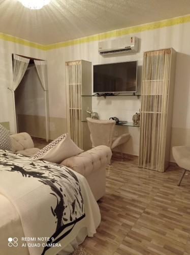 Katil atau katil-katil dalam bilik di Pousada Presidente Hotel