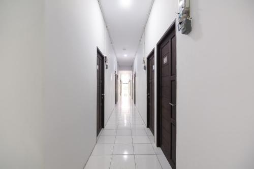 Gambar di galeri bagi Cattail Guest House Pontianak di Pontianak