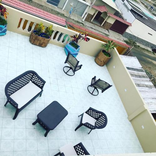 an overhead view of chairs and tables on a patio at Posada Estrella in Salinas