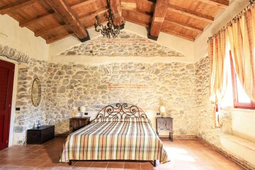 En eller flere senge i et værelse på Agriturismo La Cascina dei Chicchi