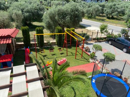 an aerial view of a park with a playground at Summer Dreams Studios in Skala Potamias
