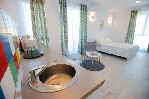 Postel nebo postele na pokoji v ubytování MIKA Studios