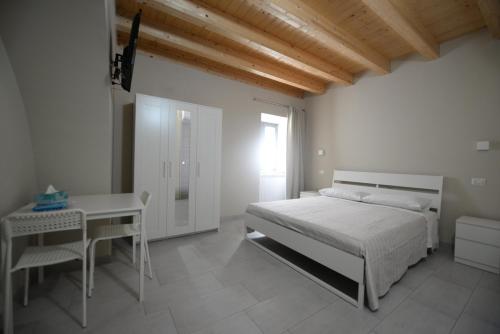 Postel nebo postele na pokoji v ubytování Sonia e Alessia