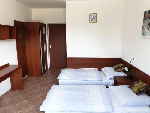 Postel nebo postele na pokoji v ubytování Turysta