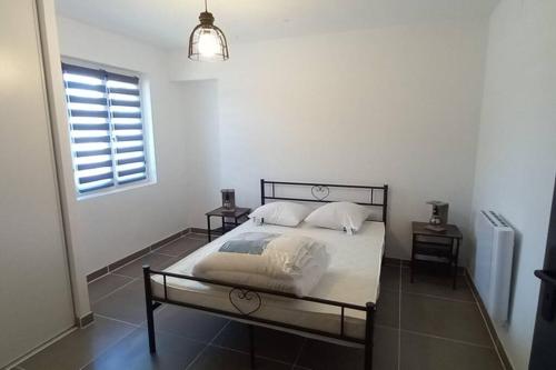 Postel nebo postele na pokoji v ubytování Gîte La Truffière