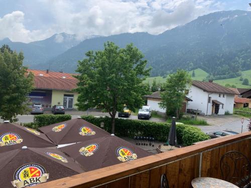 a balcony with a view of a mountain at Gasthof Löwen in Pfronten