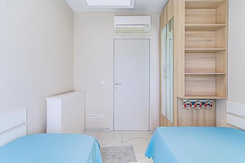 Katil atau katil-katil dalam bilik di Miramare Apartments Pržno