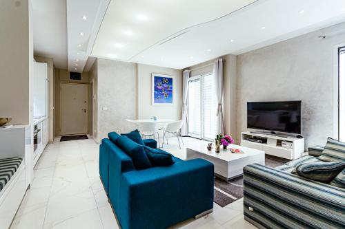 Televisyen dan/atau pusat hiburan di Miramare Apartments Pržno