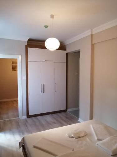 Postel nebo postele na pokoji v ubytování REGA OTEL
