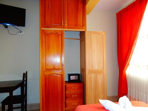 Μια τηλεόραση ή/και κέντρο ψυχαγωγίας στο Hotel Pampa & Selva