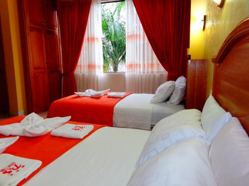 Ένα ή περισσότερα κρεβάτια σε δωμάτιο στο Hotel Pampa & Selva