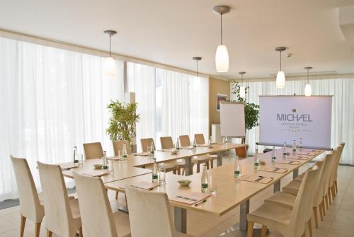 a large conference room with a long table and chairs at Hotel Michael in Prague