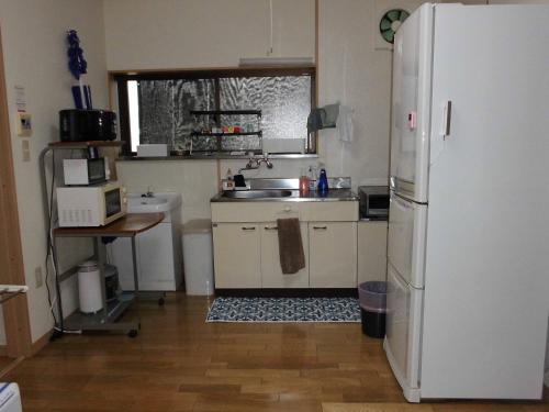 Una cocina o cocineta en Private House Mariage maison