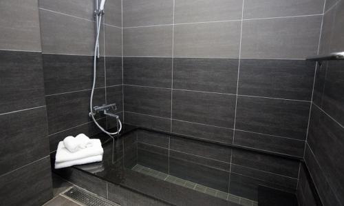 Ванная комната в π 園周綠溫泉會館 Pi Hotspring Resort