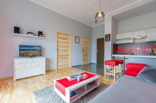 Posezení v ubytování Przytulny Apartamencik