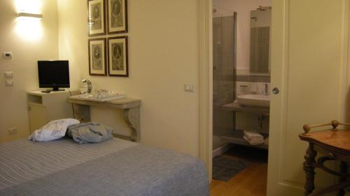 Voodi või voodid majutusasutuse B&B Camignone Franciacorta toas