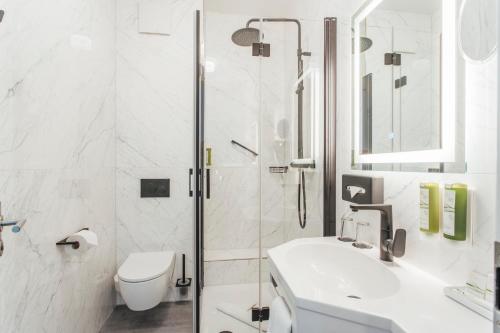 Ein Badezimmer in der Unterkunft Strandhotel Hohenzollern