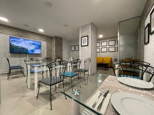 a dining room with a table and chairs at Smart Hotel Budapest in Budapest