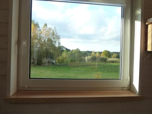 a window with a view of a field at Orle in Orle