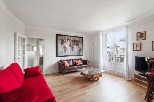 Гостиная зона в Modern apartment close to Roland-Garros Parc des Princes and Paris XVI