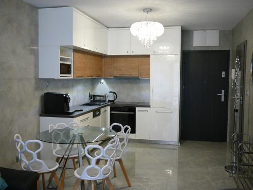 Η κουζίνα ή μικρή κουζίνα στο Gardenia II Mare Baltic Dziwnów