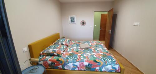 Un pat sau paturi într-o cameră la Villa au cœur du maquis