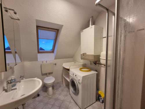 Et badeværelse på Ferienhaus Ankerplatz im Bootshaus