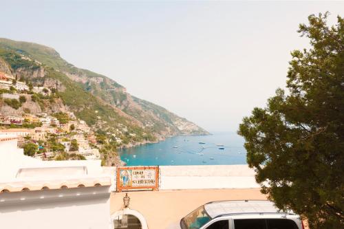 a view of the amalfi coast and the ocean at Hotel Reginella in Positano