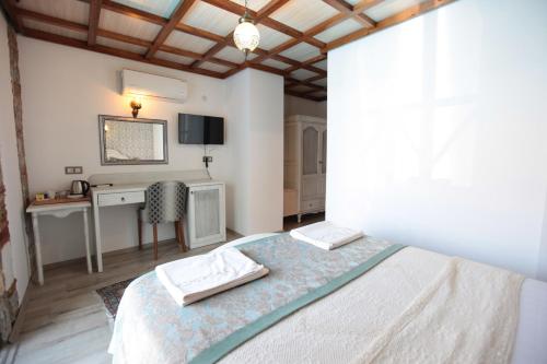 Celsus Boutique Hotelにあるベッド