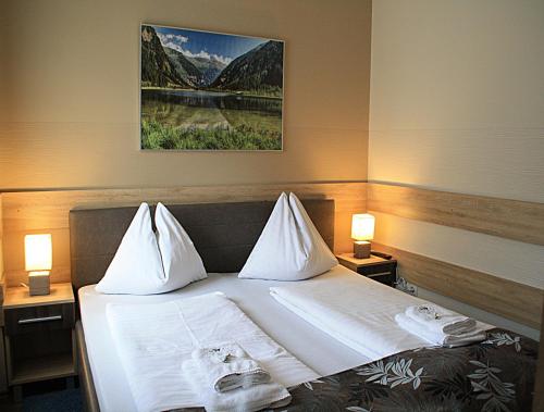 Katil atau katil-katil dalam bilik di Hotel Mallnitz