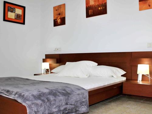 Кровать или кровати в номере SFJ Apartamento Arrecife