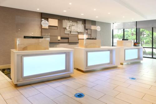 a room with two white signs on the floor at Holiday Inn Express & Suites Fort Worth Downtown by IHG in Fort Worth