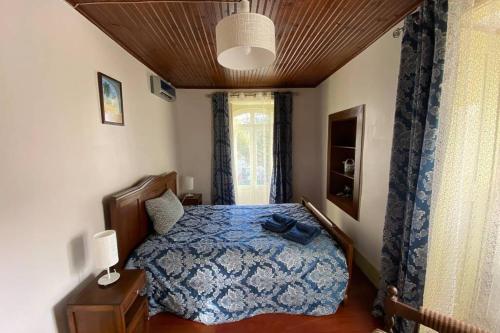 Un pat sau paturi într-o cameră la Casa do Pelourinho
