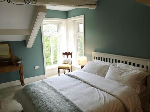 Postel nebo postele na pokoji v ubytování Kell House Bed & Breakfast
