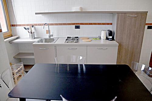 Kuchyň nebo kuchyňský kout v ubytování il bastimento