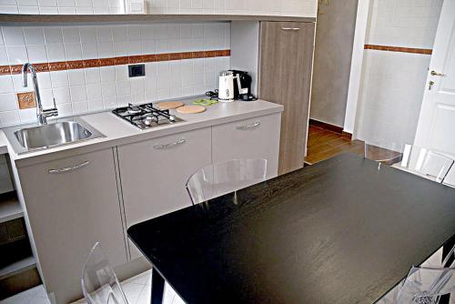 Kuchyň nebo kuchyňský kout v ubytování il bastimento