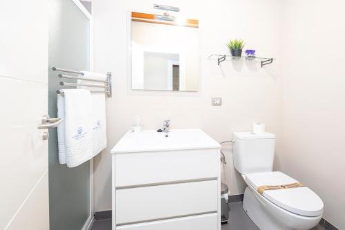 Ένα μπάνιο στο Apartamentos El Capricho